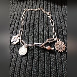 Silver Saint Benedict Charm Bracelet with Floral Accents